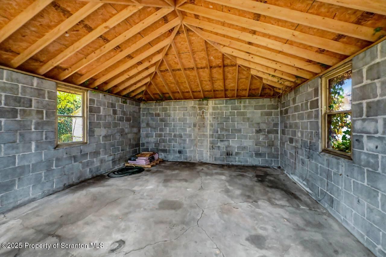 1008 Sunset Street Scranton, PA 18509 - Photo 53 of 54 a view of a room with wooden walls