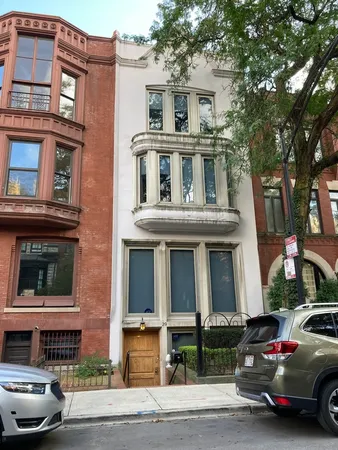 a car parked in front of a building