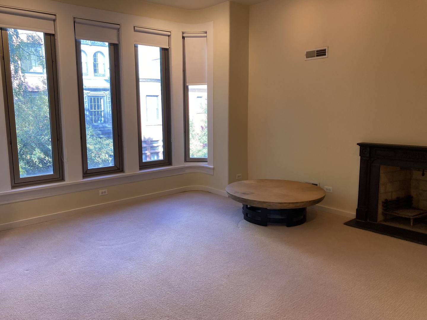 29 East Scott Street Chicago, IL 60610 - Photo 3 of 21 an empty room with windows and fireplace