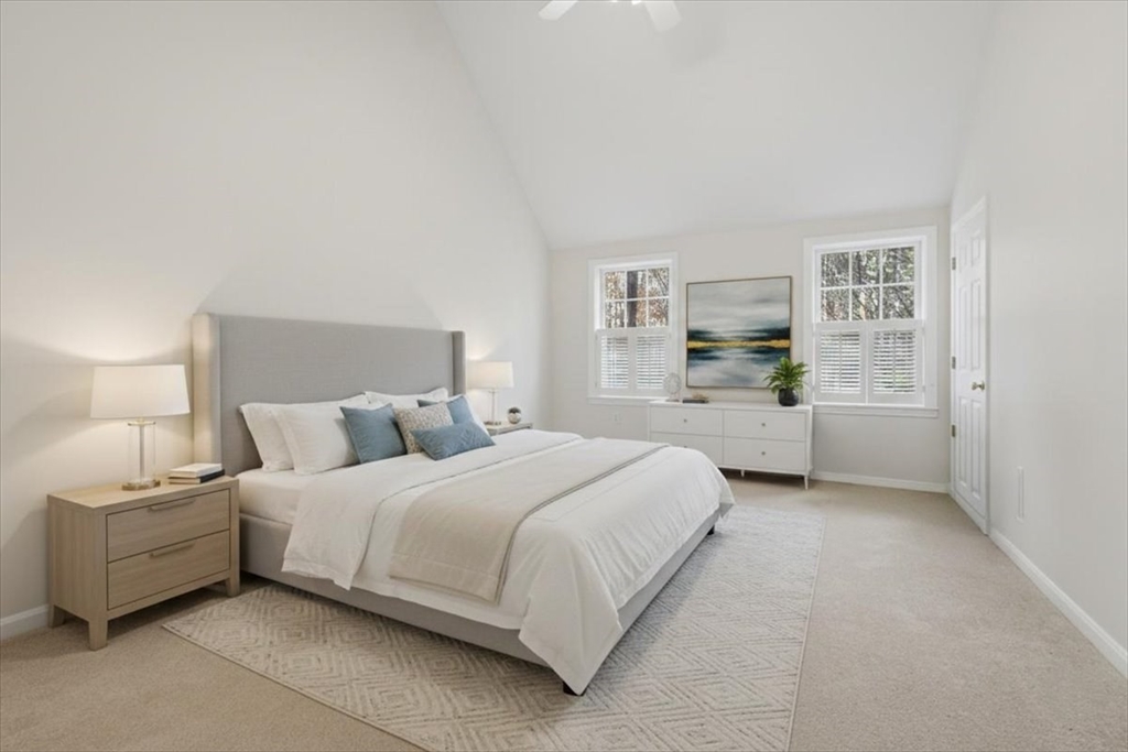 66 Box Pond Drive Bellingham, MA 02019 - Photo 11 of 41 a bedroom with a bed and a lamp on table