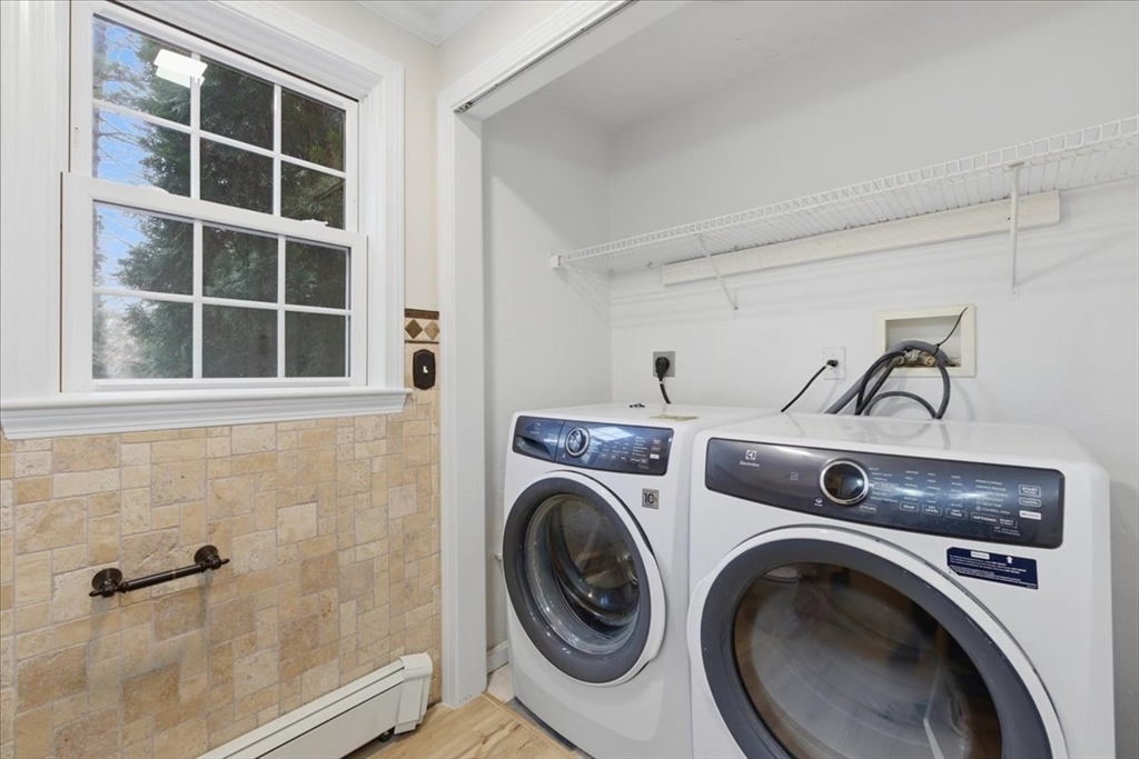 66 Box Pond Drive Bellingham, MA 02019 - Photo 17 of 41 a utility room with dryer and washer