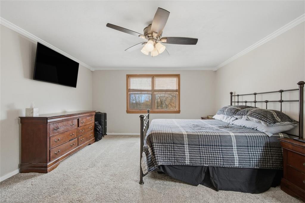 2725 Locust Drive Pittsburgh, PA 15241 - Photo 18 of 40 a bedroom with a bed and flat screen tv