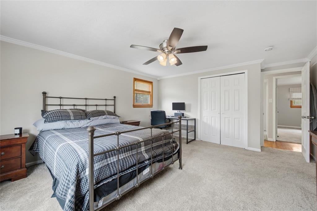 2725 Locust Drive Pittsburgh, PA 15241 - Photo 19 of 40 a bedroom with a bed and a ceiling fan