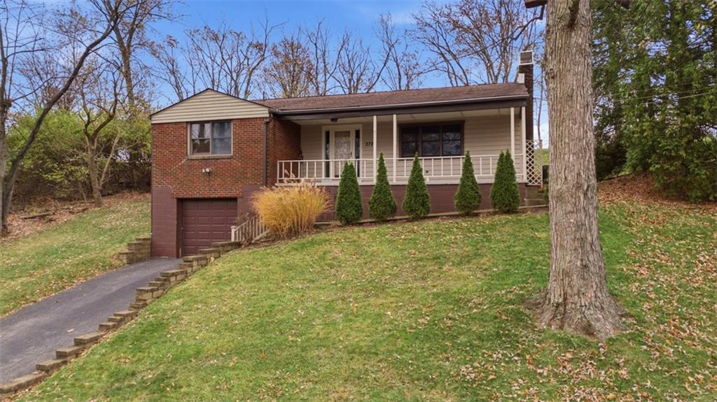 2725 Locust Drive Pittsburgh, PA 15241 - Photo 40 of 40 a front view of a house with garden
