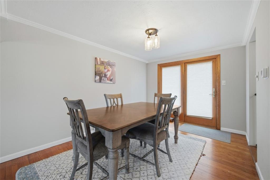2725 Locust Drive Pittsburgh, PA 15241 - Photo 9 of 40 a view of a dining room with furniture and wooden floor