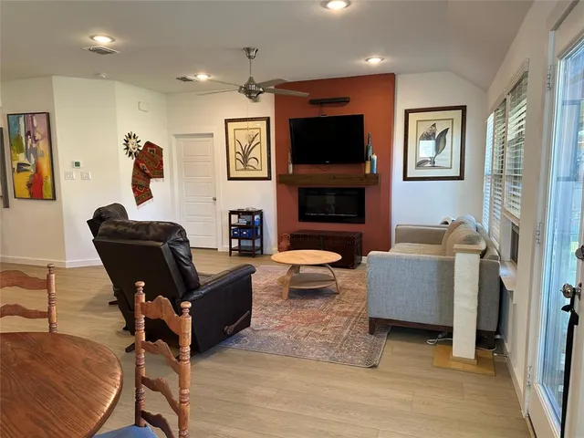 a kitchen with a sink and a refrigerator