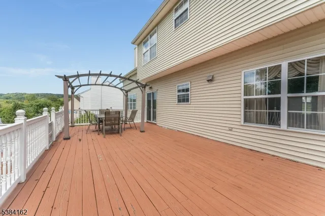 a view of a chairs and table on the wooden floor
