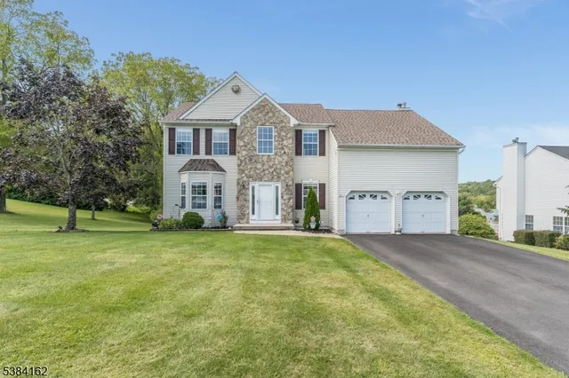 an aerial view of residential house with outdoor space