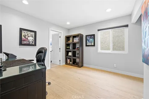 a workspace with furniture and window