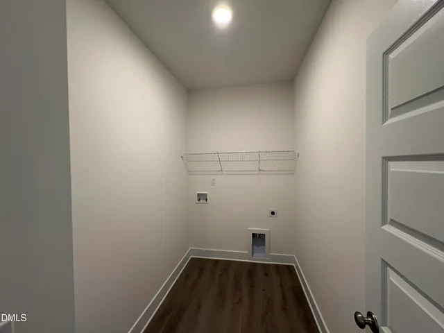 a view of small space with racks on the wall