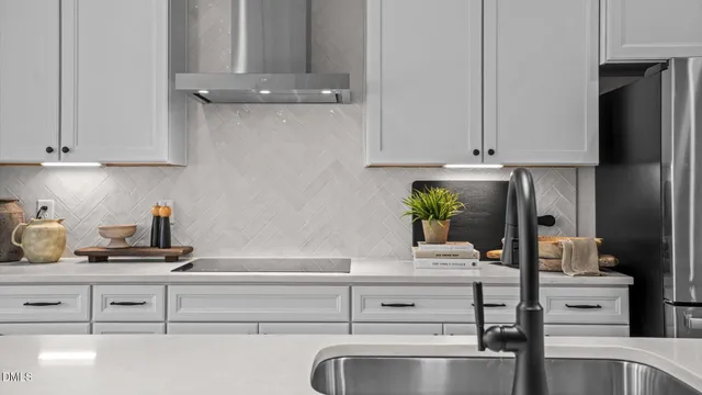 a kitchen with appliances cabinets and a counter top space