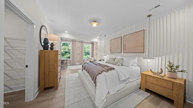 a bed room with a bed and a couch