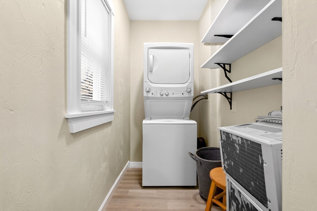 132 Vernal Street Everett, MA 02149 - Photo 11 of 22 a utility room with dryer and washer