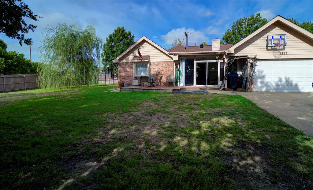 4825 Bobtown Road Garland, TX 75043 - Photo 16 of 17 a view of a house with yard and plants