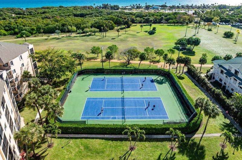 353 Highway 1, Unit C404 Jupiter, FL 33477 - Photo 28 of 30 a view of a swimming pool and a yard
