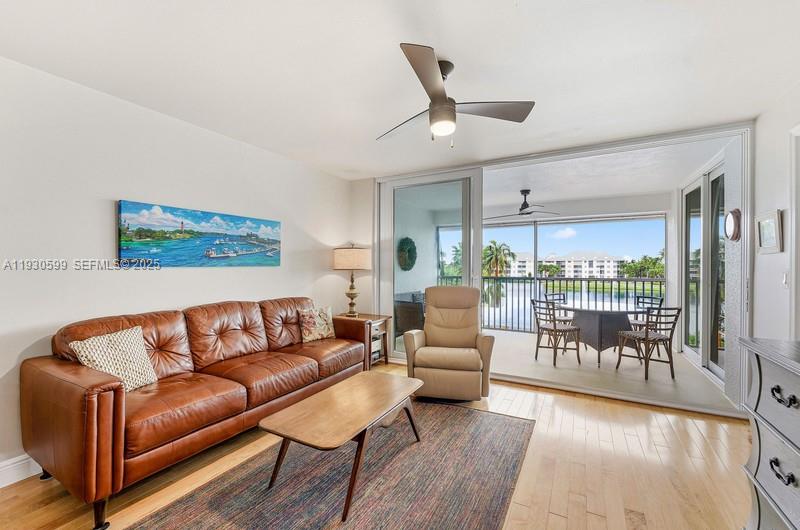 353 Highway 1, Unit C404 Jupiter, FL 33477 - Photo 3 of 30 a living room with furniture and a large window