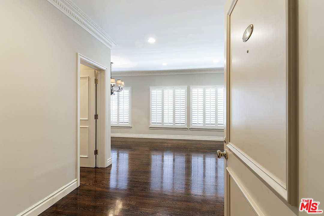 9601 Charleville Boulevard, Unit 8 Beverly Hills, CA 90212 - Photo 20 of 47 a view of an entryway with wooden floor