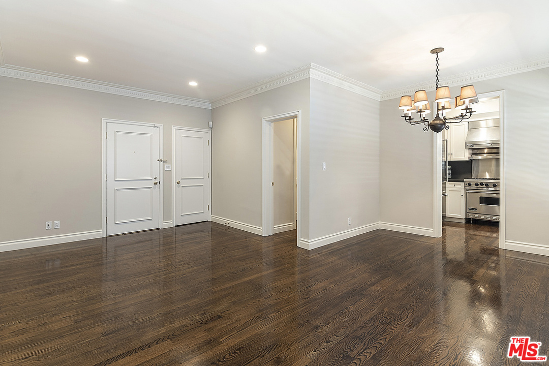 9601 Charleville Boulevard, Unit 8 Beverly Hills, CA 90212 - Photo 22 of 47 a view of empty room with wooden floor
