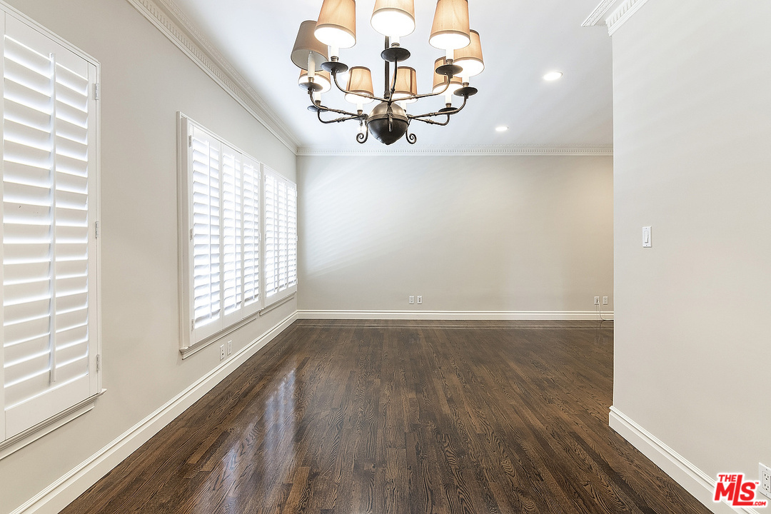 9601 Charleville Boulevard, Unit 8 Beverly Hills, CA 90212 - Photo 26 of 47 a view of a livingroom with wooden floor