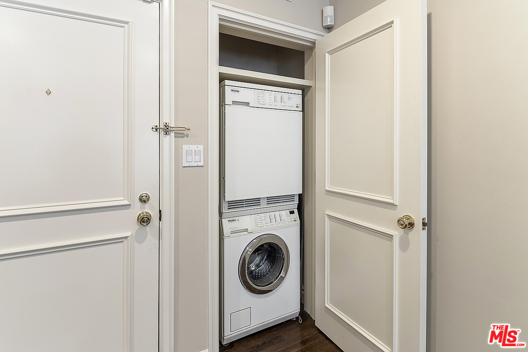 9601 Charleville Boulevard, Unit 8 Beverly Hills, CA 90212 - Photo 41 of 47 a utility room with dryer and washer