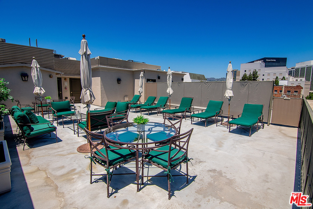 9601 Charleville Boulevard, Unit 8 Beverly Hills, CA 90212 - Photo 42 of 47 a view of a patio with furniture and a potted plants