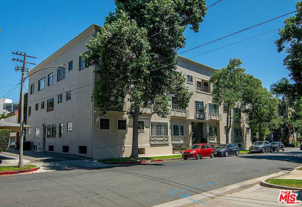 9601 Charleville Boulevard, Unit 8 Beverly Hills, CA 90212 - Photo 8 of 47 a car parked in front of a building