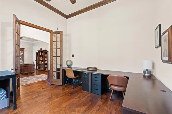 a workspace with furniture and wooden floor