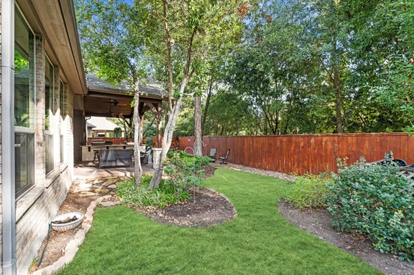 a view of garden with patio