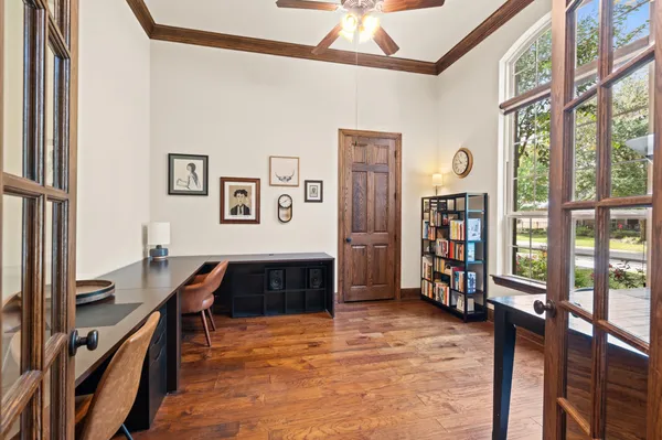 a bedroom with furniture and a window
