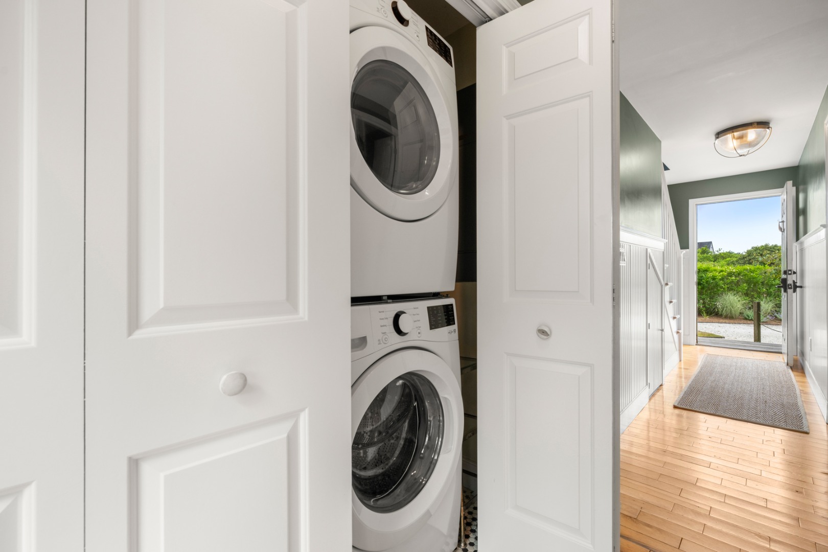 4 Berkley Street Nantucket, MA 02554 - Photo 31 of 47 a view of a hallway with washer and dryer