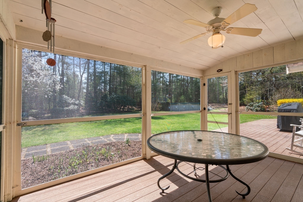 27 Stuart Road Rochester, MA 02770 - Photo 23 of 42 a view of a dining room with a table and chairs