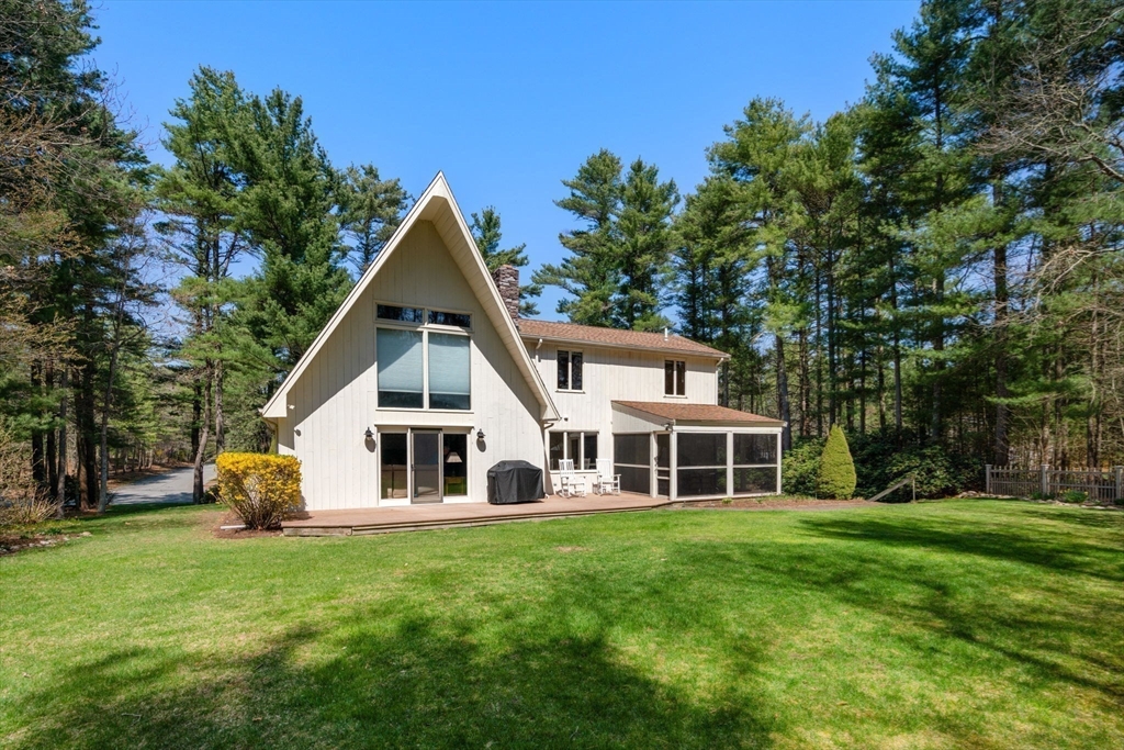 27 Stuart Road Rochester, MA 02770 - Photo 25 of 42 a front view of house with yard and green space