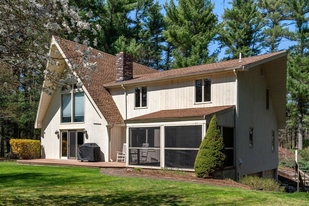 27 Stuart Road Rochester, MA 02770 - Photo 28 of 42 front view of house with a yard