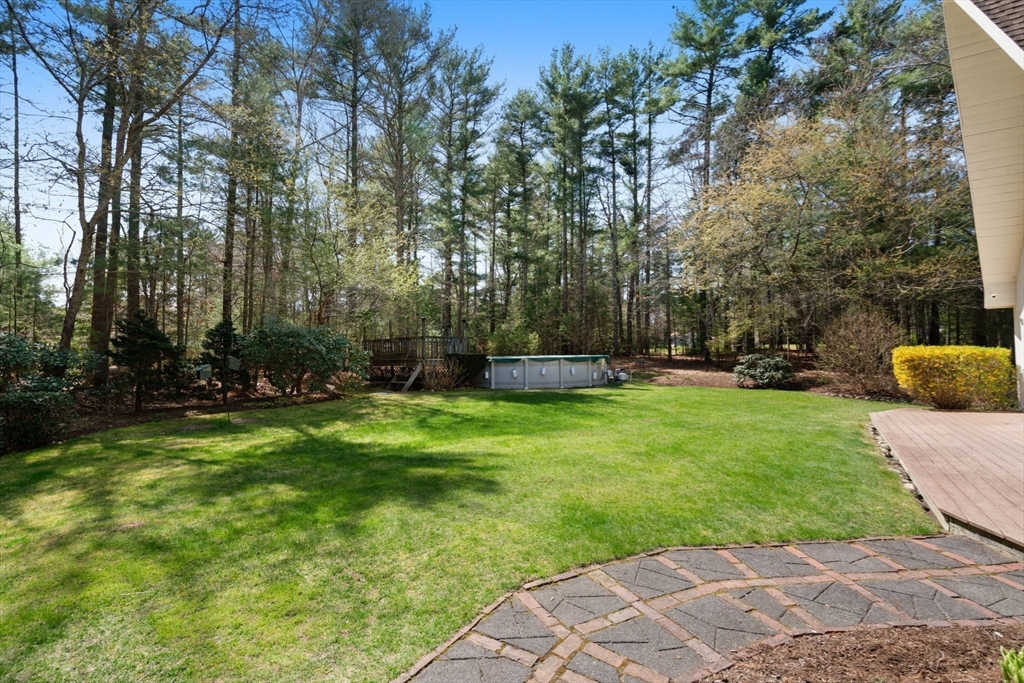 27 Stuart Road Rochester, MA 02770 - Photo 30 of 42 a view of a garden with a tree