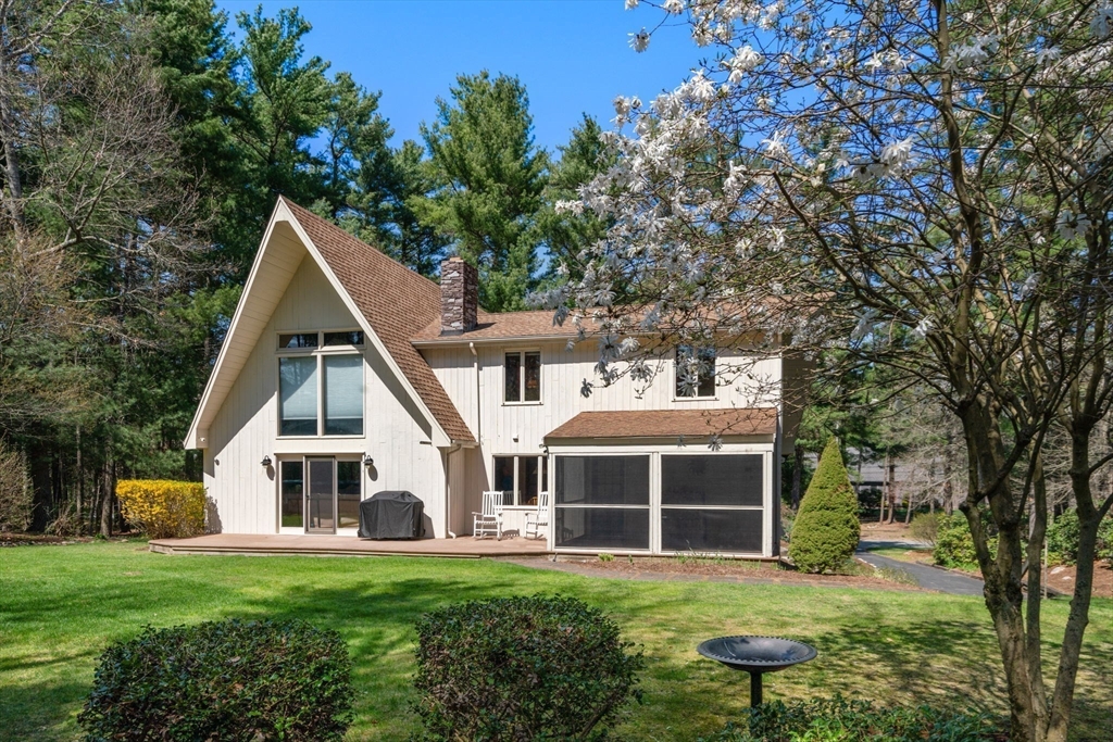 27 Stuart Road Rochester, MA 02770 - Photo 5 of 42 a view of a house with a yard and sitting area