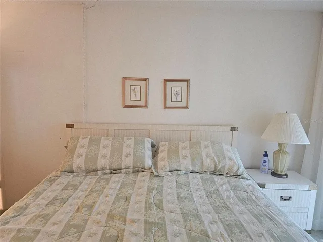 a room with a bed and a table