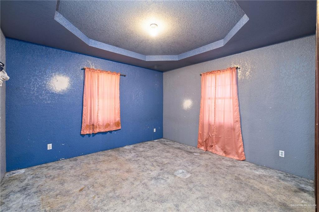 117 Hernandez Road Rio Grande City, TX 78582 - Photo 14 of 23 an empty room with a window