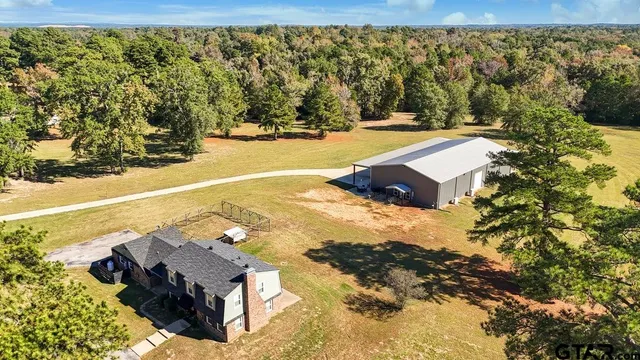 a view of a yard with an outdoor space