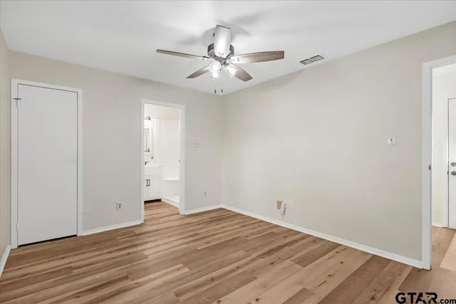 a view of parking garage with cars