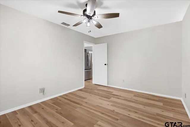 a view of parking garage with cars