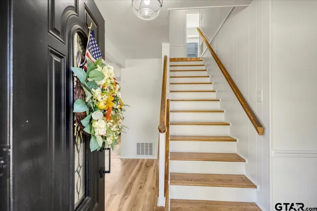 a view of a livingroom with a flat screen tv