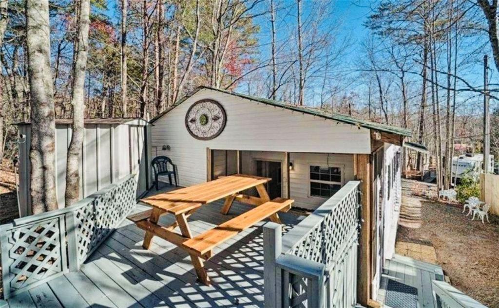 a view of a patio with table and chairs