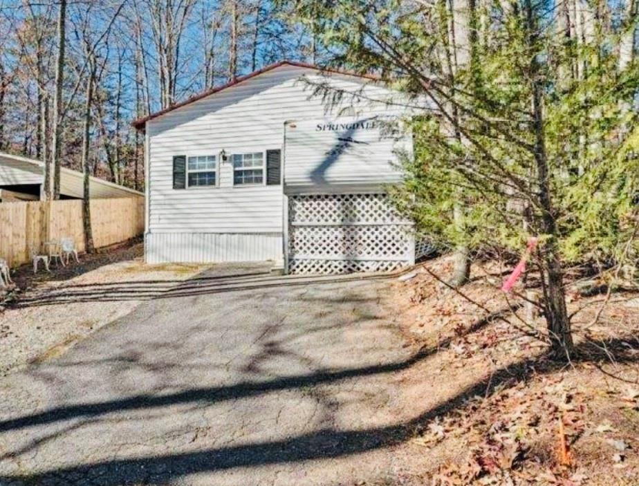 146 Canyon Pass Cleveland, GA 30528 - Photo 2 of 21 a view of a house with a yard