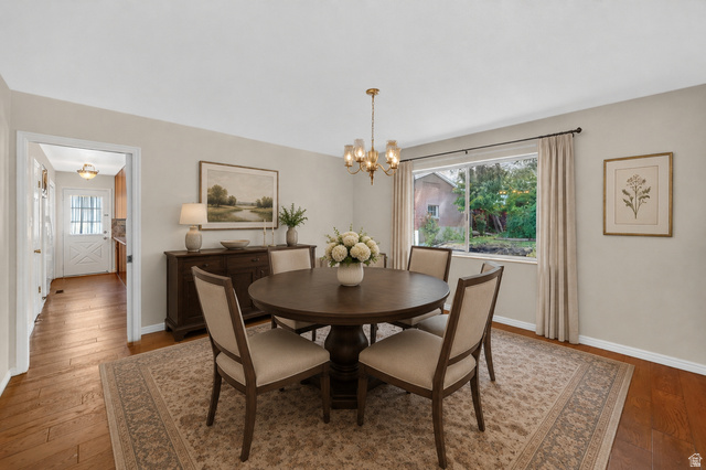 3120 North Apache Way Provo, UT 84604 - Photo 5 of 58 Dining area featuring wood-finish flooring and a central brass chandelier