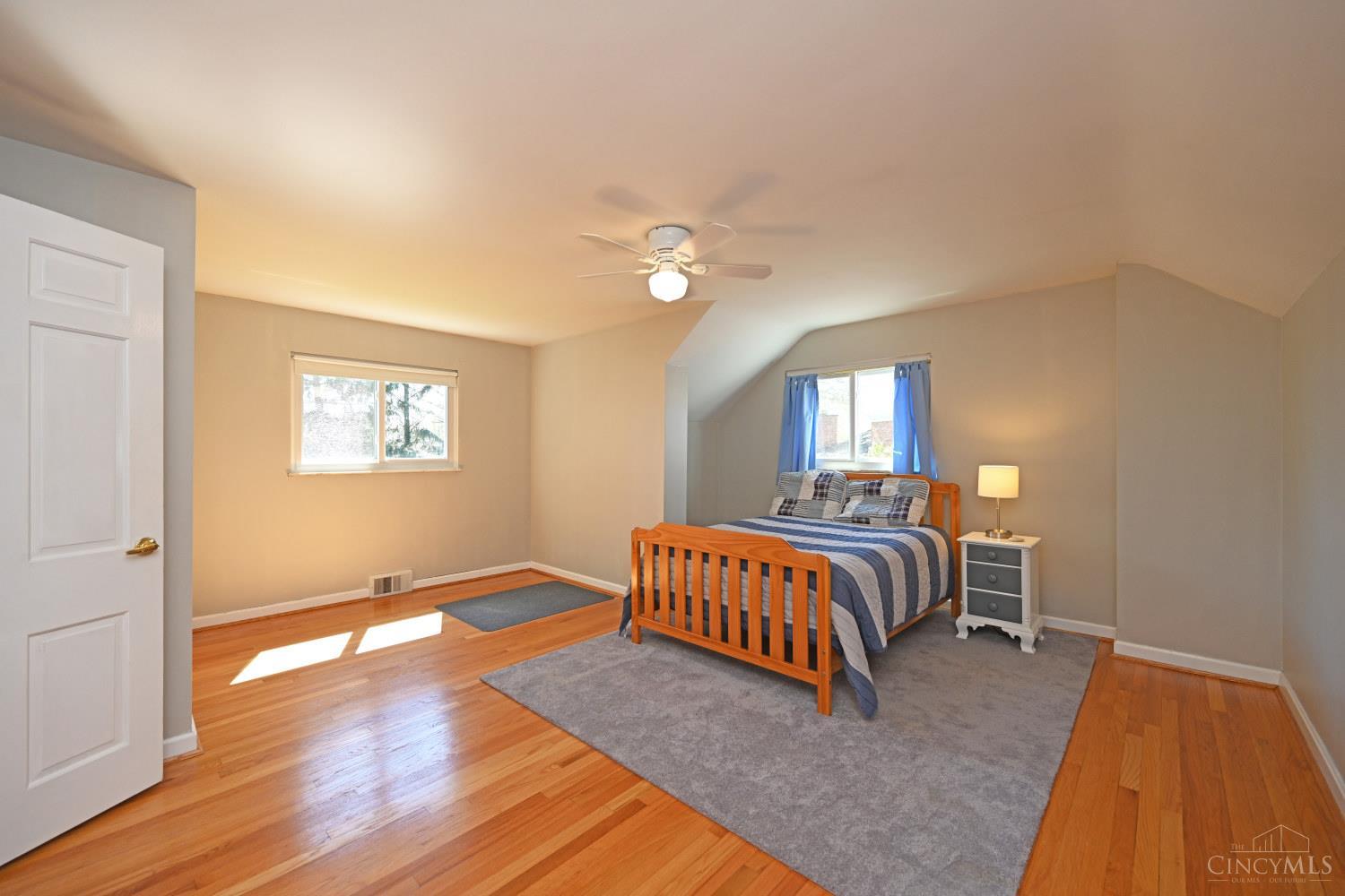 8851 Roundhill Road Cincinnati, OH 45236 - Photo 20 of 34 4th bedroom upstairs, large room and closet, attic storage space and impeccibly maintained hardwood floors.
