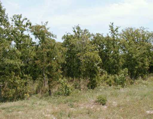 Exterior Front : View of land.