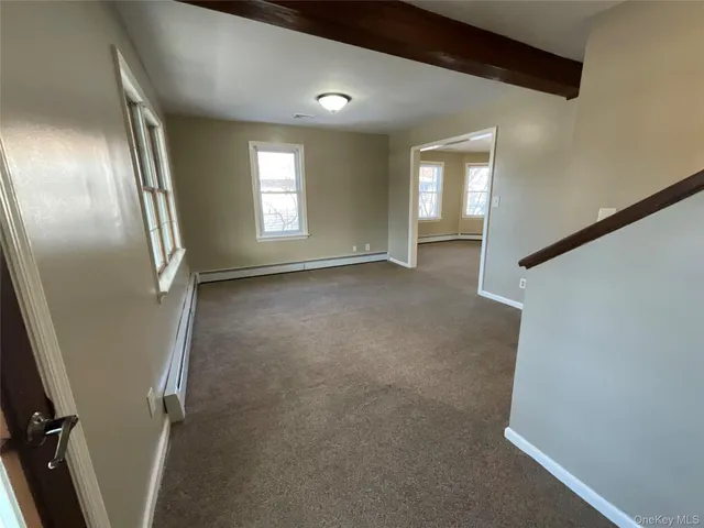a view of livingroom with hardwood floor and window