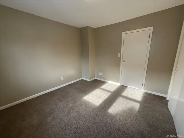 an empty room with a natural light