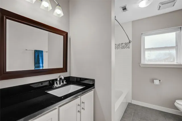 a view of house with outdoor space