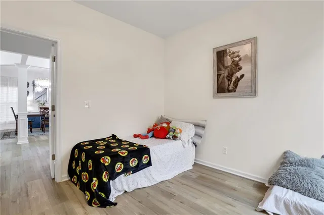 a bathroom with a sink vanity mirror and toilet